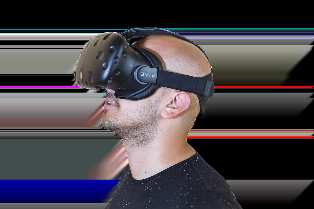 Giocatore immerso in un gioco di realtà virtuale indossando visore VR